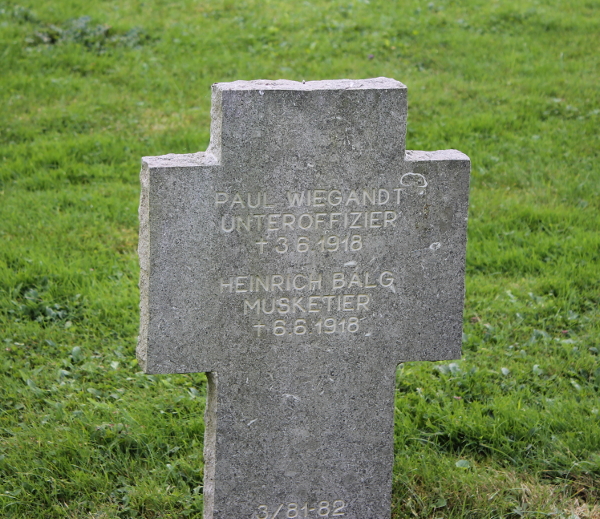 Shared headstone of Paul Wiegandt, Unteroffizier (Sergeant), died June 3, 1918, and Heinrich Balg, Musketier (Infantryman), died June 6, 1918, Dormans German Cemetery, Dormans, France.
Text:
Paul Wiegandt
Unteroffizier [Sergeant]
† 3.6.1918

Heinrich Balg
Musketier [Infantryman]
† 6.6.1918