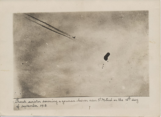 Photograph of a French aviator downing a German observation balloon near St. Mihiel on September 16, 1918, the last day of the American St. Mihiel Offensive. That same day American airmen Frank Luke and Joe Wehner downed three balloons in the sector.
Text:
French aviator downing a german observer near St Mihiel on the 16th day of september 1918