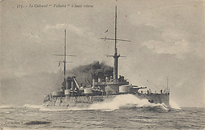 The French battleship "Voltaire" at full speed
Text:
513. Le Cuirassé "Voltaire" à toute vitesse — The French battleship "Voltaire" at full speed
Collection F. C ???
Reverse:
O.A.S. (On Active Service). I hope you are both well and enjoying some fine weather. I expect you have been bothered lately with some nocturnal visitors. I hope Stewart is fit. I am settling down in la belle France. Joan is 4 on Wednesday. I expect there will be some excitement. How time flies. I am now in the 3rd (S) Co[mpan]y. ? R.G.B Suffolk Regt. A.R.O. S/50 France. Weather keeps fine. With kindest [?] regards. I'm yrs v. sincerely. G. ?
Stamped: Passed Field Censor 5168
Postmarked Army Post Office 1917