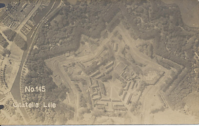 German aerial photograph of the Citadel of Lille, France, c. 1916, showing the star-shaped citadel designed by Vauban.
Text:
No. 145; Citatelle Lille
Reverse handwritten message:
Couldn't get any good pictures of Lille when I was there but here in Germany I find their official aeroplane photos are pretty fair.