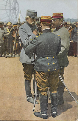 French General Maurice Sarrail decorating officers near the frame of German Zeppelin shot down on May 5, 1916 by naval gunners in view of the citizens of Salonica, Greece. General Sarrail commanded the Allied troops at the front that included French, British, Serbian, Russian, and Italian troops, as well as a battalion of Montenegrin soldiers. The Zeppelin's frame is in the background, and civilians are among the observers of the ceremony.
Text (reverse):
Salonicco — Il Gen. Sarrail distribuisce decorazioni nei pressi della carcassa dello Zeppelin
Salonique — Remise de décorations à des officiers devant la carcasse du Zeppelin par le Gen. Sarrail
Salonica — Gen. Sarrail decorating officers before the Carcass of a Zeppelin
Editeur Hananel Naar — Salonique
Proprieté réservée
Handwritten:
Orient - Vive la (?) Victor