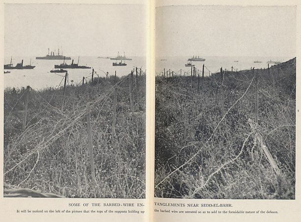 Barbed wire entanglements near Sedd-el-Bahr, at the southern end of the Gallipoli Peninsula, 1915. Ships of the Allied Fleet lie offshore. Photograph from 'Gallipoli' by John Masefield.
Text:
Some of the barbed wire entanglements near Sedd-el-Bahr
It will be noticed on the left of the picture that the tops of the supports holding up the barbed wire are serrated so as to add to the formidable nature of the defense.