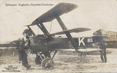 A Sanke postcard of a captured British Sopwith Triplane being wheeled along.
Text:
Erbeuteter Englische Sopwith Dreidecker
Captured British Sopwith Triplane
1036
Postkartenvertrieb W. Sanke
Berlin N.27
Nachdruck wird gerichtlich verfolgt.
Postcard Distributor W. Sanke
Berlin N.27
Reproduction will be prosecuted.
Reverse:
Postmarked March 2, 1918