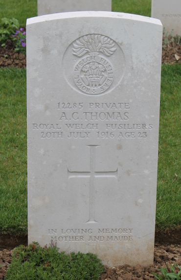 Headstone of Private A.C. Thomas of the Royal Welch Fusiliers in Delville Wood Cemetery, Longueval, France. Thomas died July 20, 1916, aged 23.
Text:
12285 Private
A.C. Thomas
Royal Welch Fusiliers
20th July 1916 Age 23
In Loving Memory
Mother and Maude