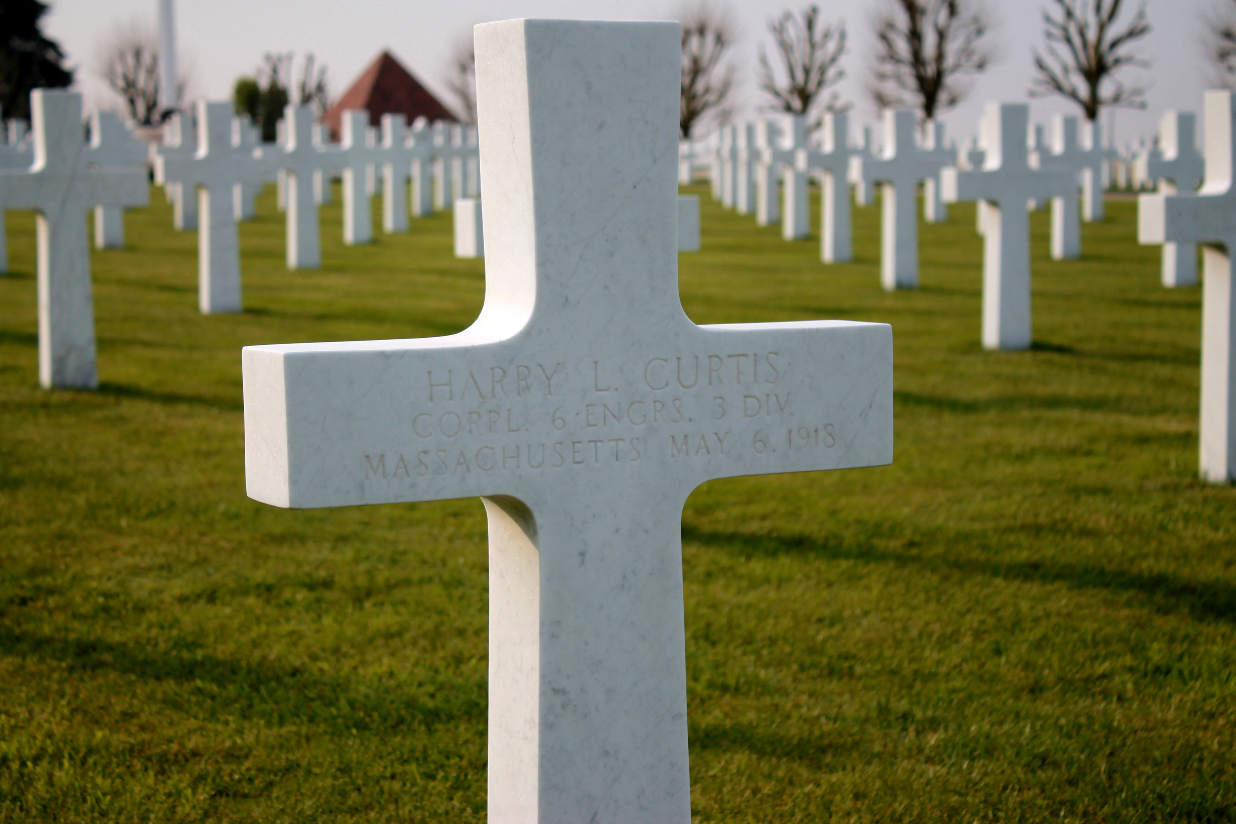 Headstone of Corporal Harry L. Curtis of Massachusetts and the 6th Engineers, 3rd Division, at the Somme American Cemetery, Bony, France. Curtis died on May 6, 1918.