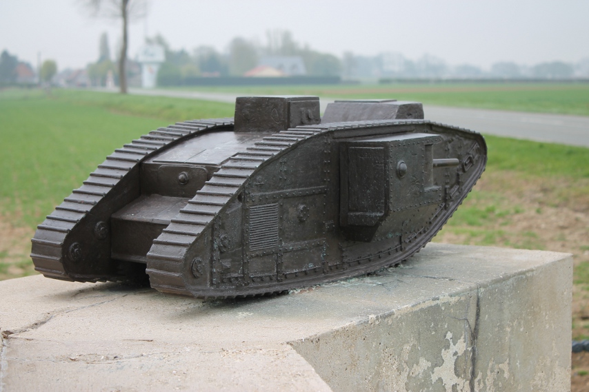 A Mark V tank from the monument to the Tank Corps, Pozières, France. (Thanks to James Reeve of the site Landships II for the following: The model on the monument is of a Mk V. You can tell by the second cab on the roof towards the rear, and the ventilation louvres on the side towards the rear. Also, the Mk IV male carried 3 machine guns (1 in the cab and 1 in each sponson) as well as the 6 pounders, and the female 5 (1 in the cab and 2 in each sponson). The Mk V had an additional machine gun fitted in the rear panel, making 4 in the male and 6 in the female.)
Inscription:
Near this spot the first tanks used in war went into action on 15th Sept 1916
This monument is erected to the memory of the officers, warrant officers, non-commissioned officers & men of
The Tank Corps who fell in action in the years 1916-1917-1918 during The Great War.
Three additional plaques list the battles in which the Tanks Corps fought:
1916 - 1st Somme, Ancre
1917 - 1st Arras, Messines, 3rd Ypres, 1st Cambrai
1918 - 2nd Somme, River Lys, Hamel-Marne-Moreuil, Amiens-Bapaume, Arras-Epehy, Cambrai-St. Quentin, Selle-Mormal Forest